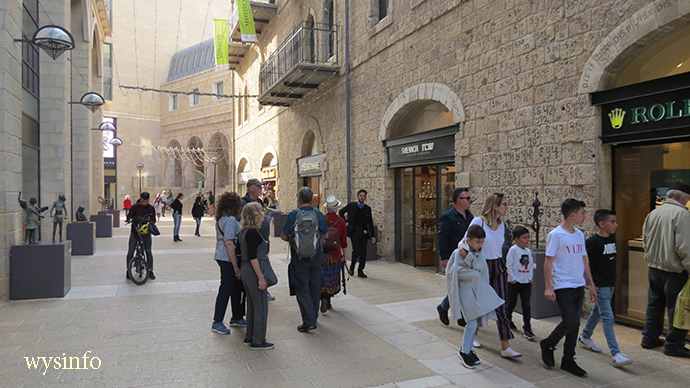 Mamilla Promenade showing reconstructed building with numbers mapping the stones
